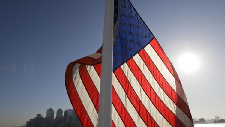 US Economy Adds Strong 311,000 Jobs, Wages Grow Less Than
Expected