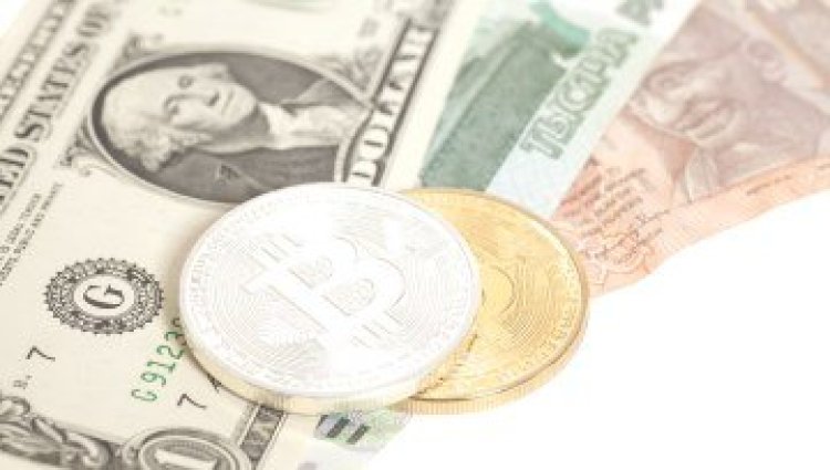 Bitcoin and Ethereum Extend Gains on Hopes of Less-Hawkish
Fed
